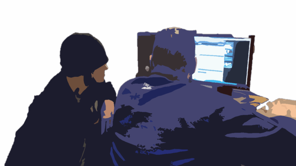 Welding students viewing online welding course.